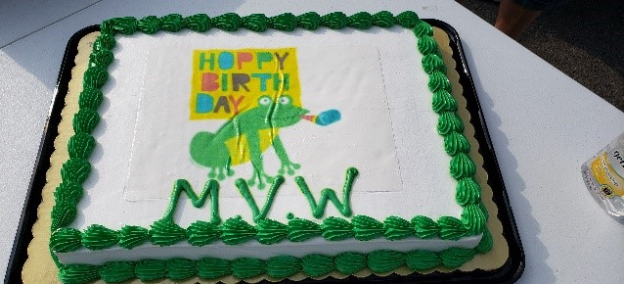 Birthday cake with a frog on it.